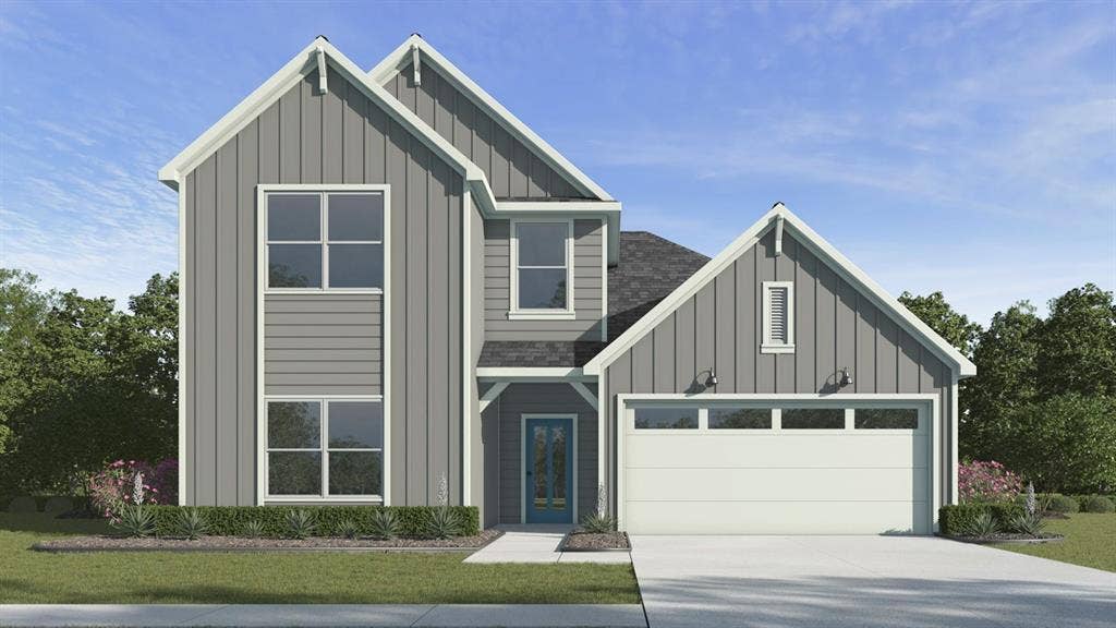 6053 Freedom Drive, Lindale, TX 75771 Contemporary two-story exterior featuring gray siding, white trim, and multiple gables