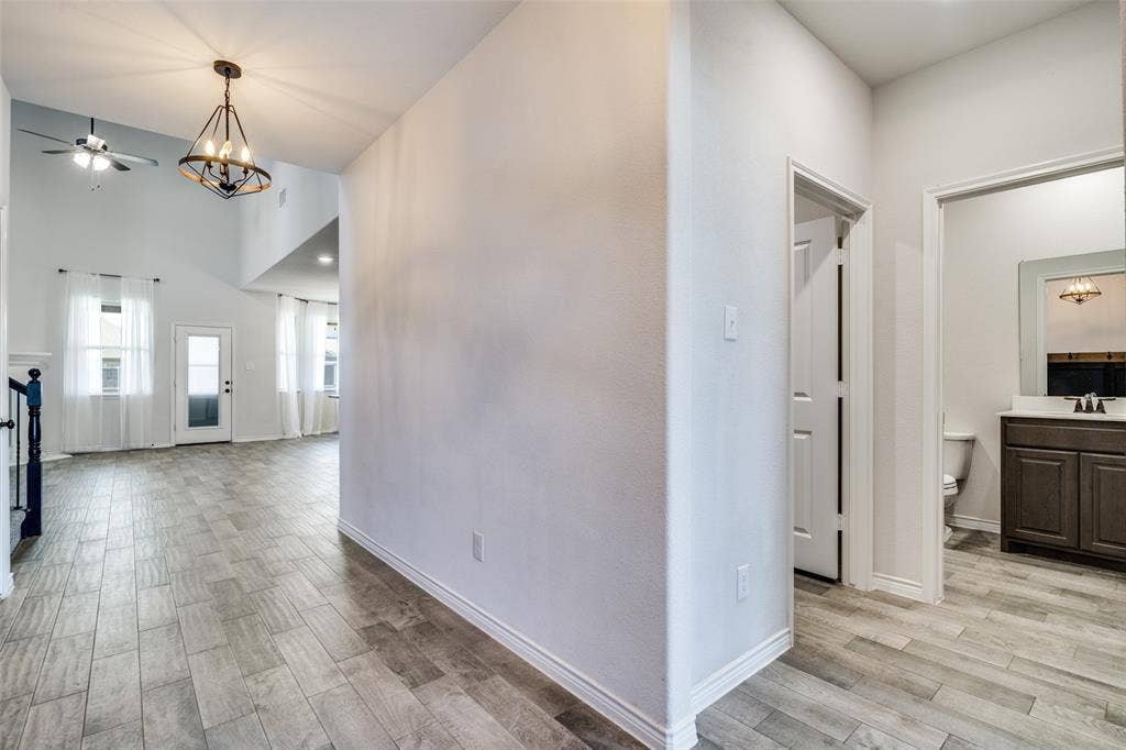 3094 Maverick Drive, Heath, TX 75126 Separate bedroom/office, full bath and utility room off of entry