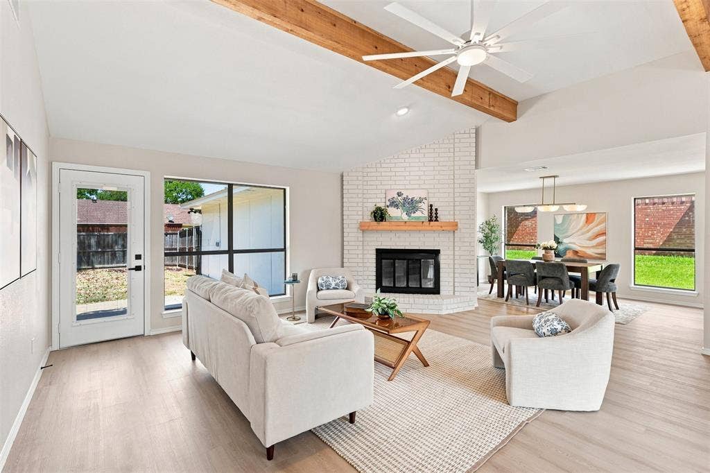7321 Burke Circle, Plano, TX 75025 Vaulted ceiling with exposed wood beams and a ceiling fan