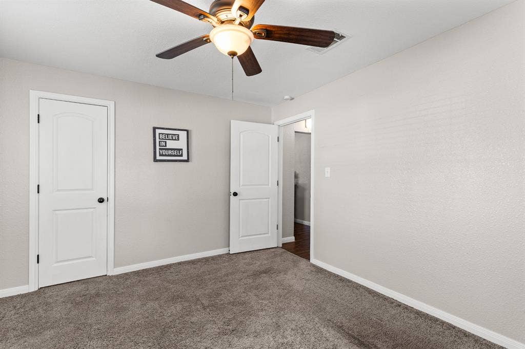 3700 Charlton Avenue, Waco, TX 76711 Interior room featuring plush gray carpeting and neutral wall tones