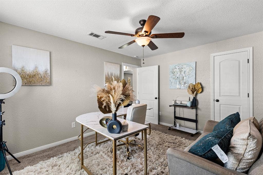 3700 Charlton Avenue, Waco, TX 76711 Room featuring neutral wall paint, a ceiling fan with integrated lighting, and carpet flooring