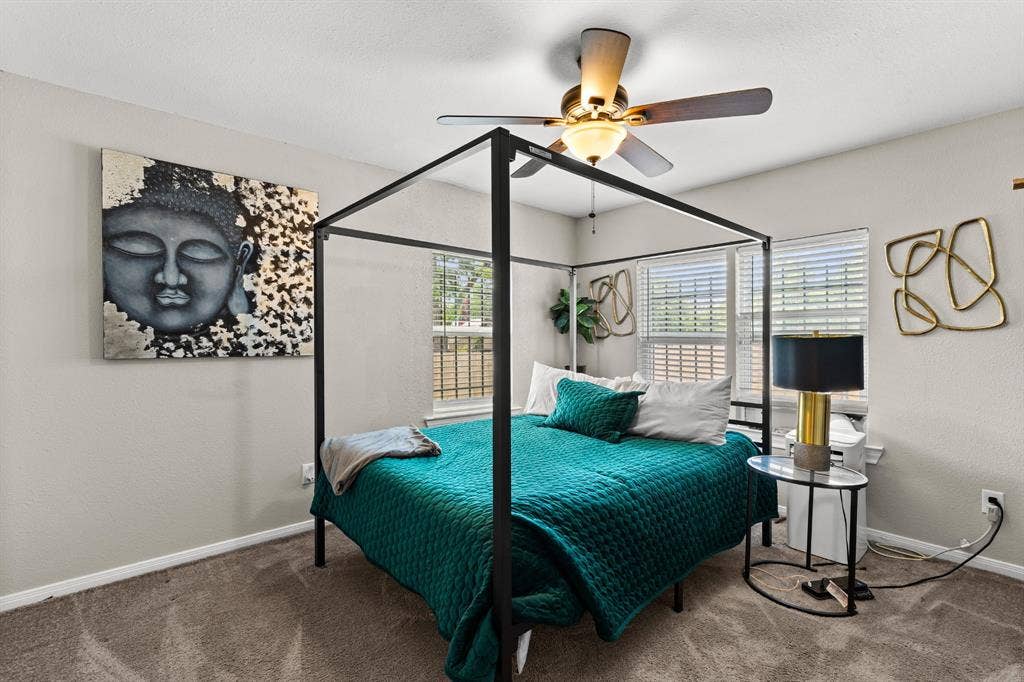 3700 Charlton Avenue, Waco, TX 76711 Spacious bedroom featuring neutral wall tones and plush carpeting