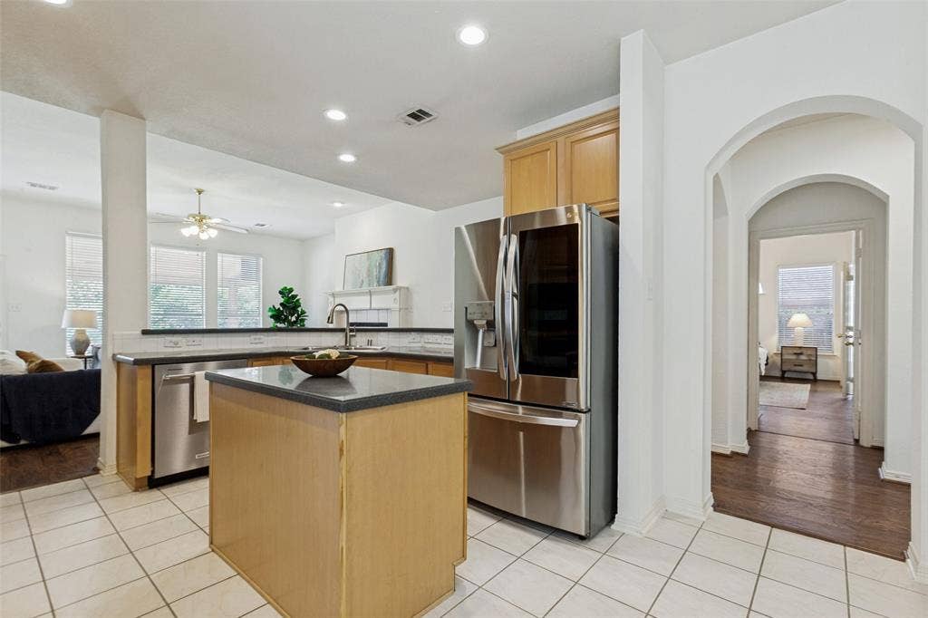 162 Shelby Trace, Murphy, TX 75094 Beautiful arches lead to the primary bedroom