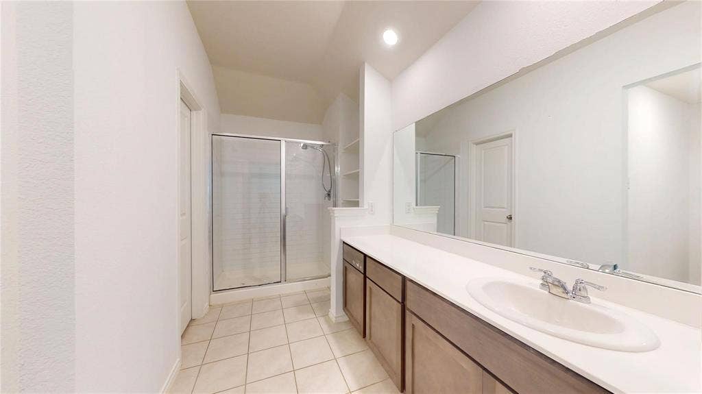 717 Cottonwood Way, Royse City, TX 75189 White countertop vanity with integrated sink and chrome faucet