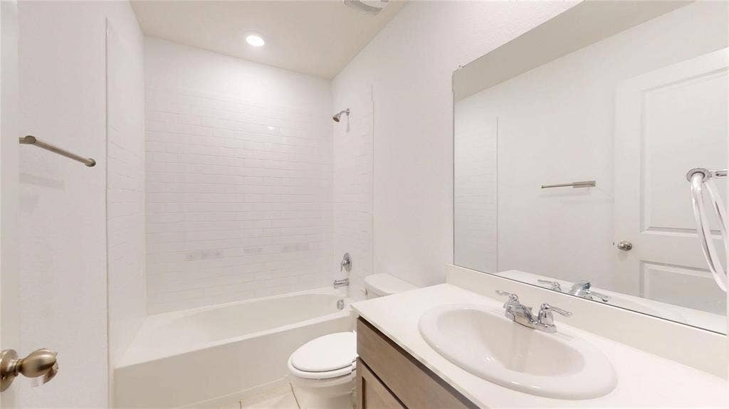 717 Cottonwood Way, Royse City, TX 75189 Bathroom vanity with a white countertop and integrated sink