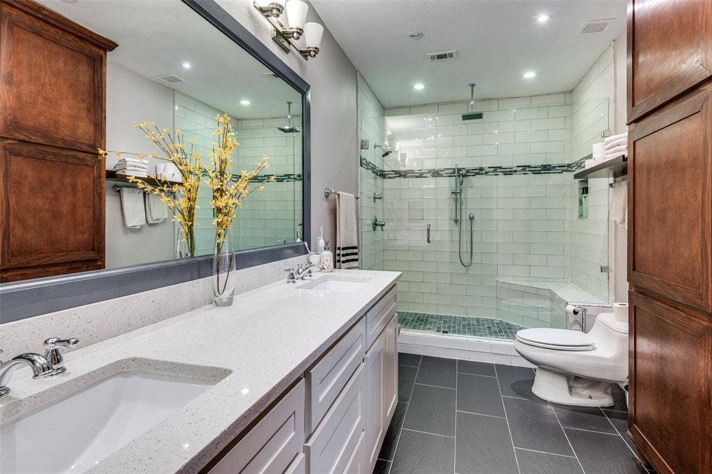 330 Las Colinas Boulevard E, #1016, Irving, TX 75039 Primary bathroom with large walk-in shower and dual sinks and massive mirror