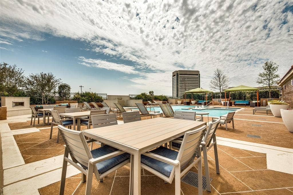 330 Las Colinas Boulevard E, #1016, Irving, TX 75039 Four lighted gas grills located on the pool deck