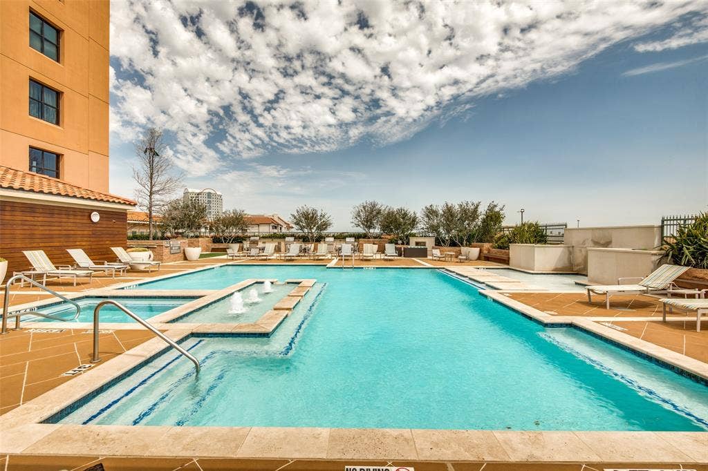 330 Las Colinas Boulevard E, #1016, Irving, TX 75039 Rooftop pool with hot tub and shaded cabanas