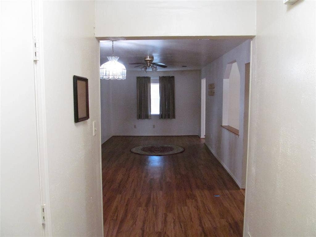 740 Emberwood Drive, Dallas, TX 75232 BACKDOOR VIEW OF HALLWAY LOOKING ON TO THE FAMILY LIVING ROOM
