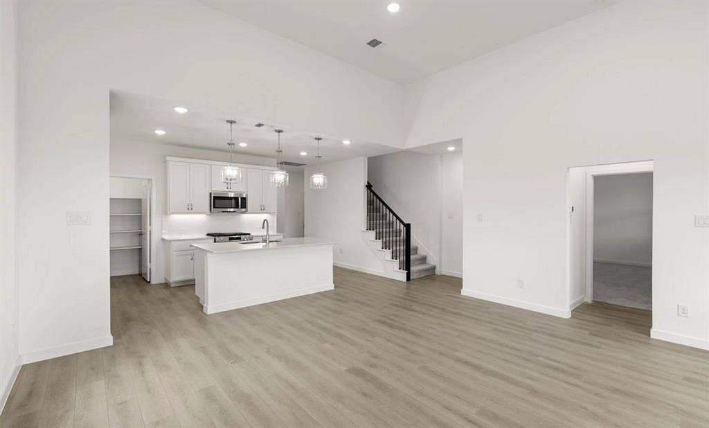 2206 Franklin Street, Princeton, TX 75407 Open Kitchen-Dining Room Representative Photo