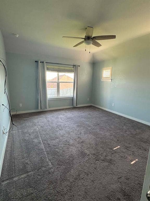 Fort Worth, TX 76123 Spacious room featuring gray carpet, a ceiling fan with light fixture, and light blue wall paint