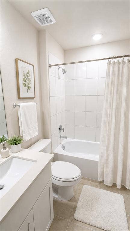 1317 crookpost Drive, Princeton, TX 75407 Full bathroom featuring a white vanity with an integrated sink, a white toilet, and a white tub/shower combination with white tile surround