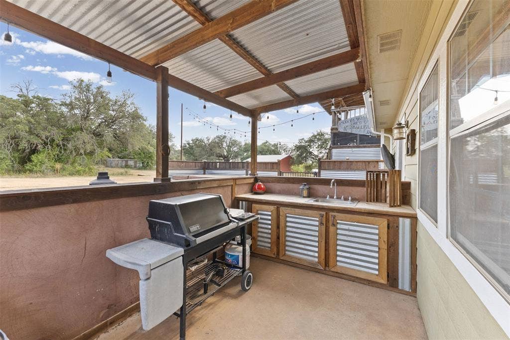 325 Bolton Road, Granbury, TX 76049 Outdoor kitchen with sink. Grill is negotiable.