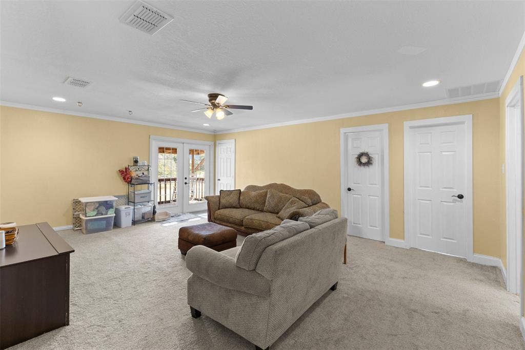 325 Bolton Road, Granbury, TX 76049 Upstairs bonus/family room with French doors to a private balcony, room for a second living area, media room, or game room.