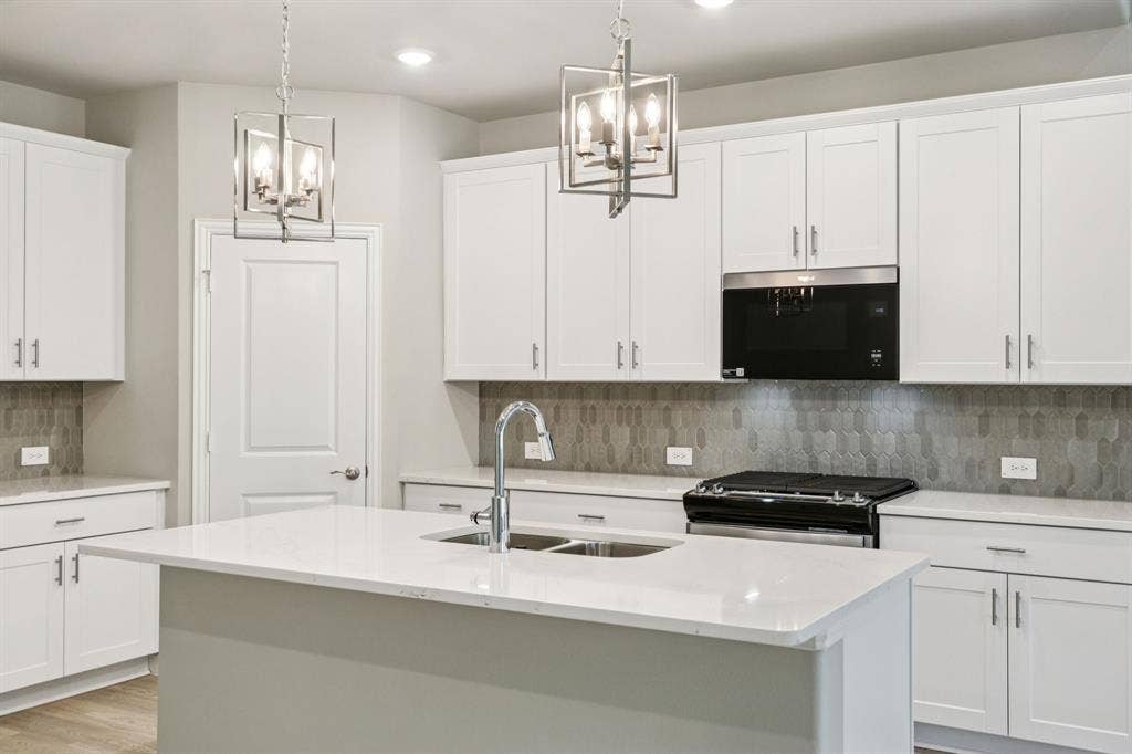 Photo is not of the actual home, but is an inspirational photo of builder’s model home and may depict options, furnishings, and/or decorator features that are not included.