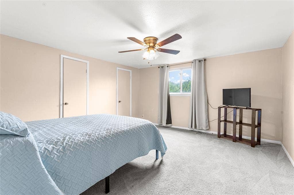 6930 Trailcrest Drive, Dallas, TX 75232 Carpeted room featuring light beige walls and a white ceiling