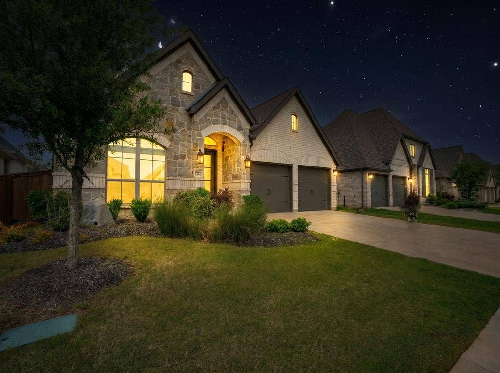 Stone and brick facade with arched entryway