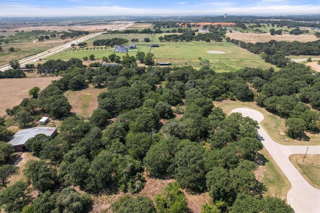 1213 Nottaway Court, Burleson, TX 76028 This type of land is not available everywhere. Luxury country living near the city amenities!