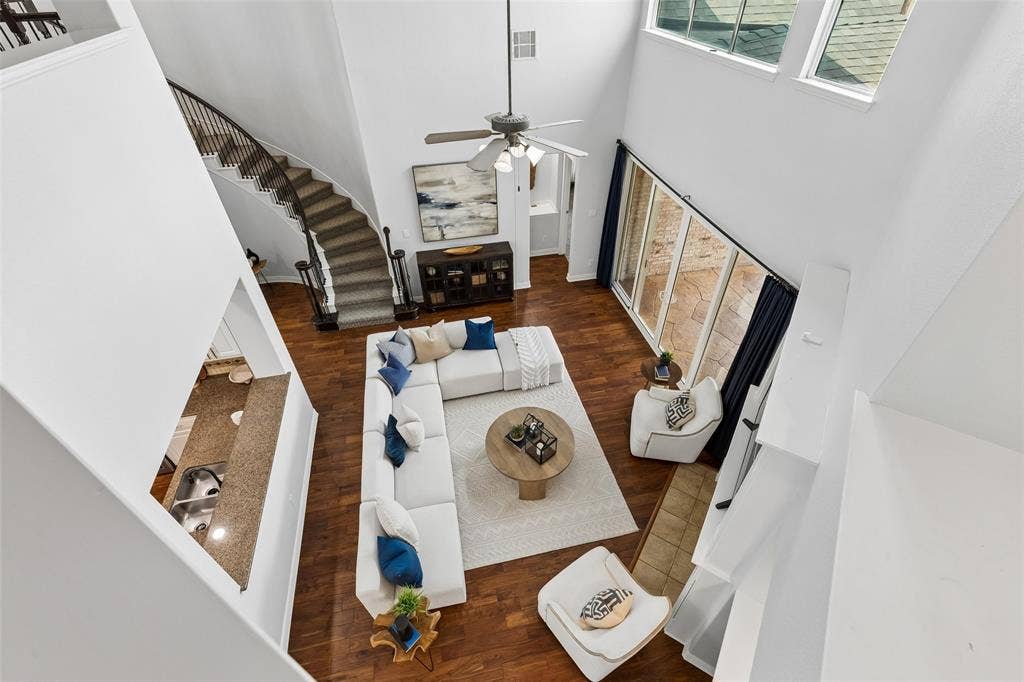 7975 Bishop Drive, Frisco, TX 75036 Aerial view of the main level living room from the 2nd level.