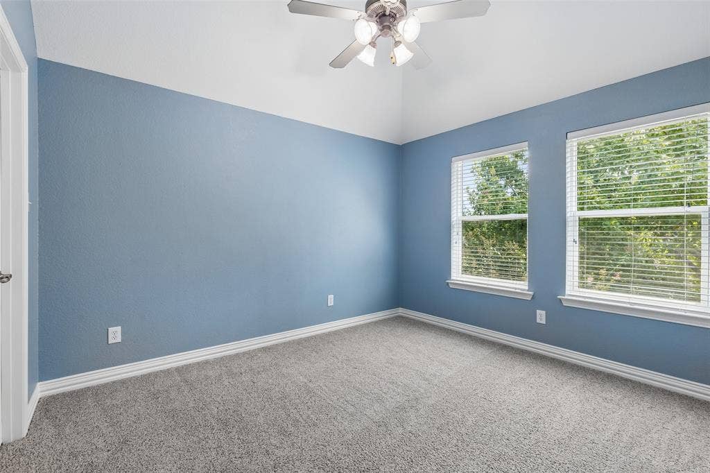 7975 Bishop Drive, Frisco, TX 75036 2nd level guest bedroom with walk in closet.