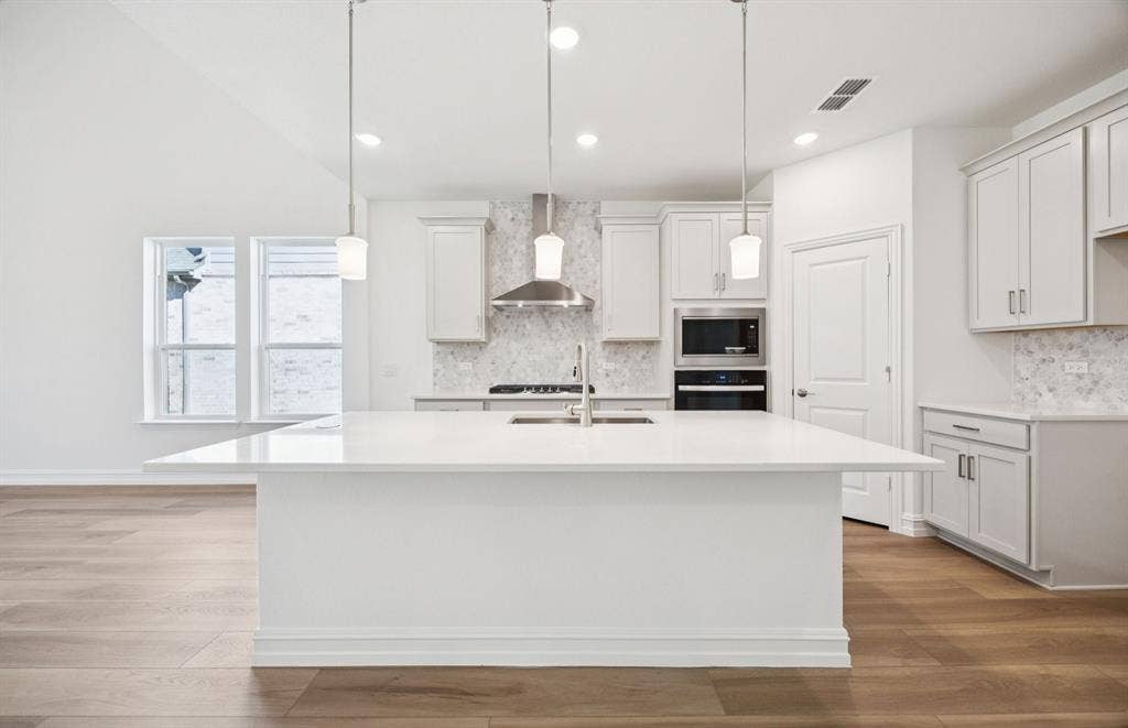 4821 Ripley Avenue, Celina, TX 75009 *Floorplan representation, not actual home - Spacious kitchen with eat-in bartop island
