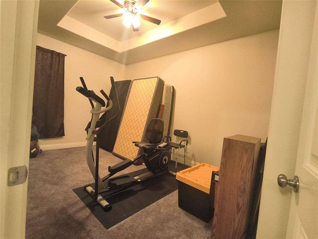 3027 Ames Road, Lancaster, TX 75134 Recessed tray ceiling with a ceiling fan