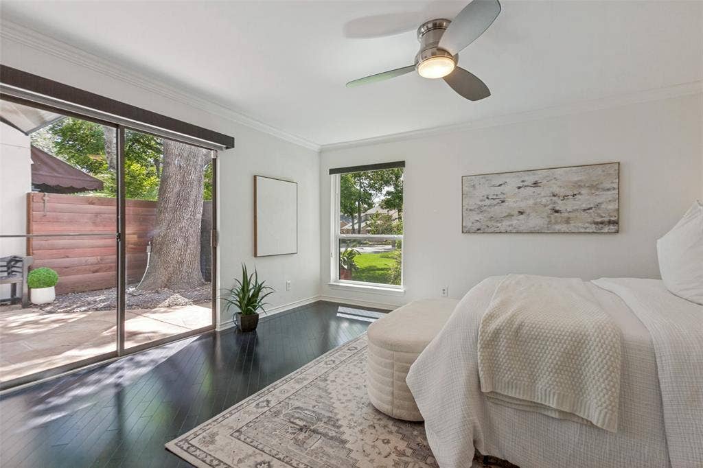 6362 Southpoint Drive, Dallas, TX 75248 Sliding glass doors leading to an outdoor patio