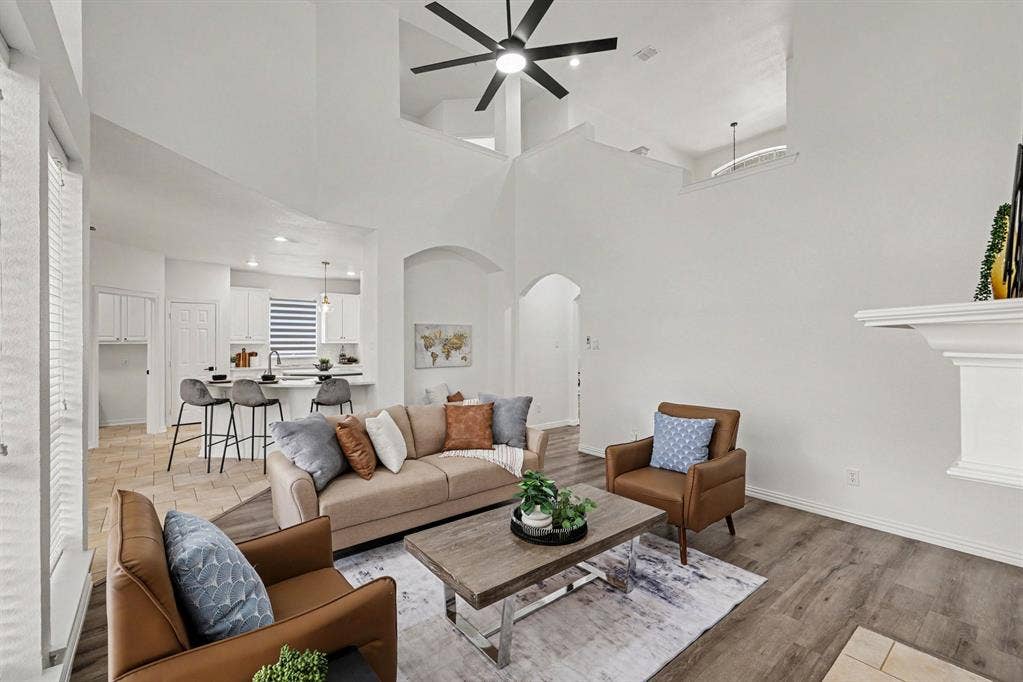 7904 Alderwood Place, Plano, TX 75025 Vaulted ceilings featuring a ceiling fan and upper architectural details