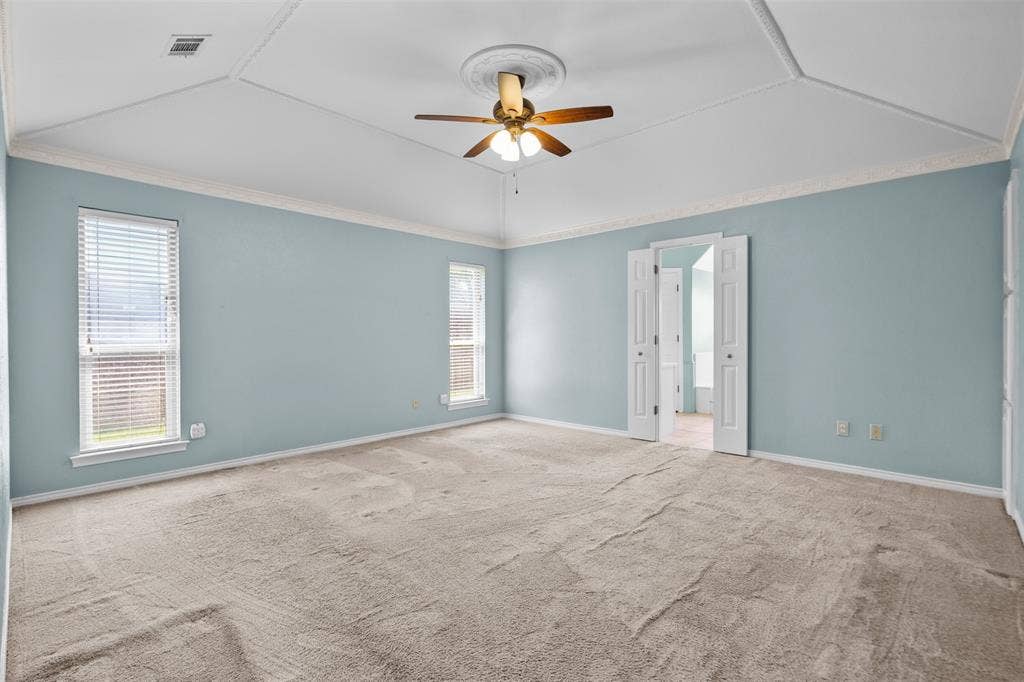 2112 Evergreen Drive, Plano, TX 75075 Primary bedroom with vaulted ceilings