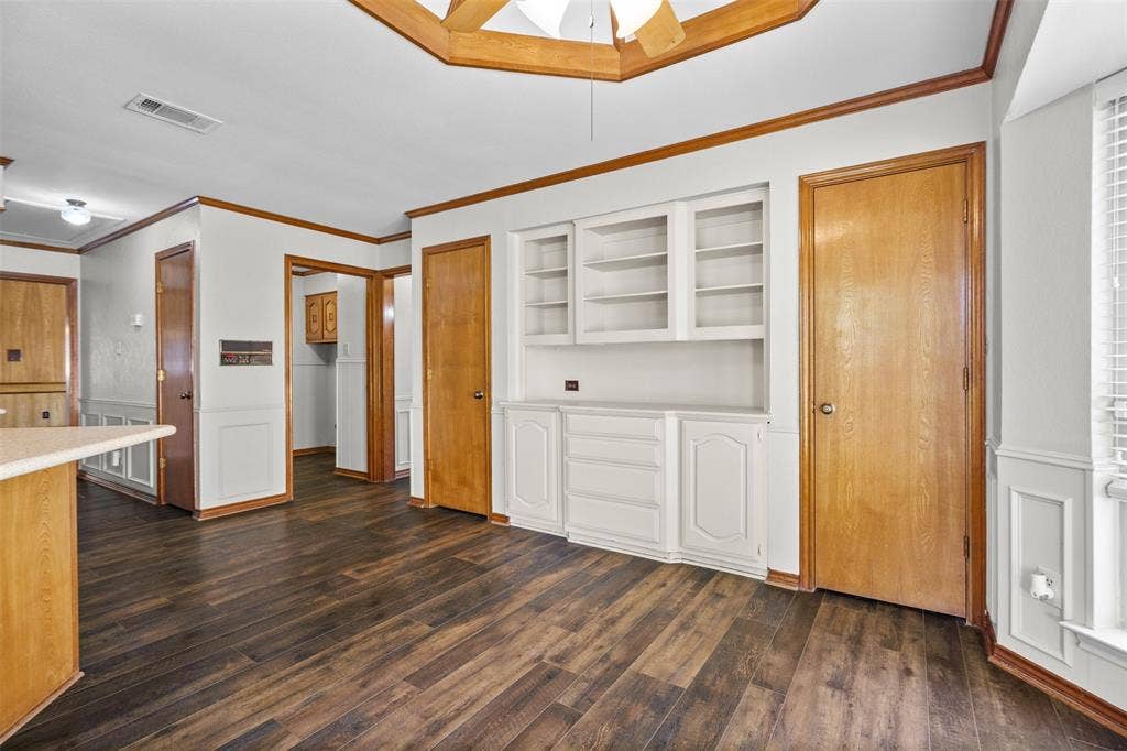 2112 Evergreen Drive, Plano, TX 75075 Dining area with vaulted ceilings, built in storage, and 2 pantries.