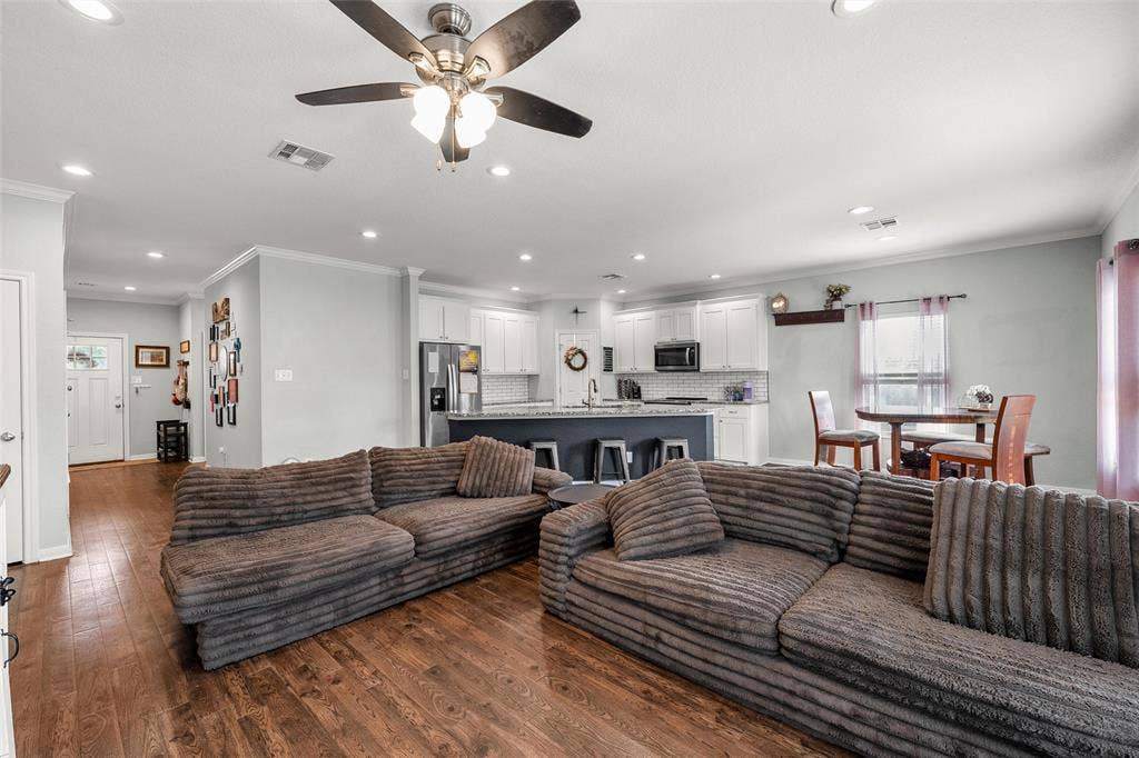 215 Greenbriar Street, Robinson, TX 76706 Living area featuring wood-finish flooring, recessed lighting, and a ceiling fan