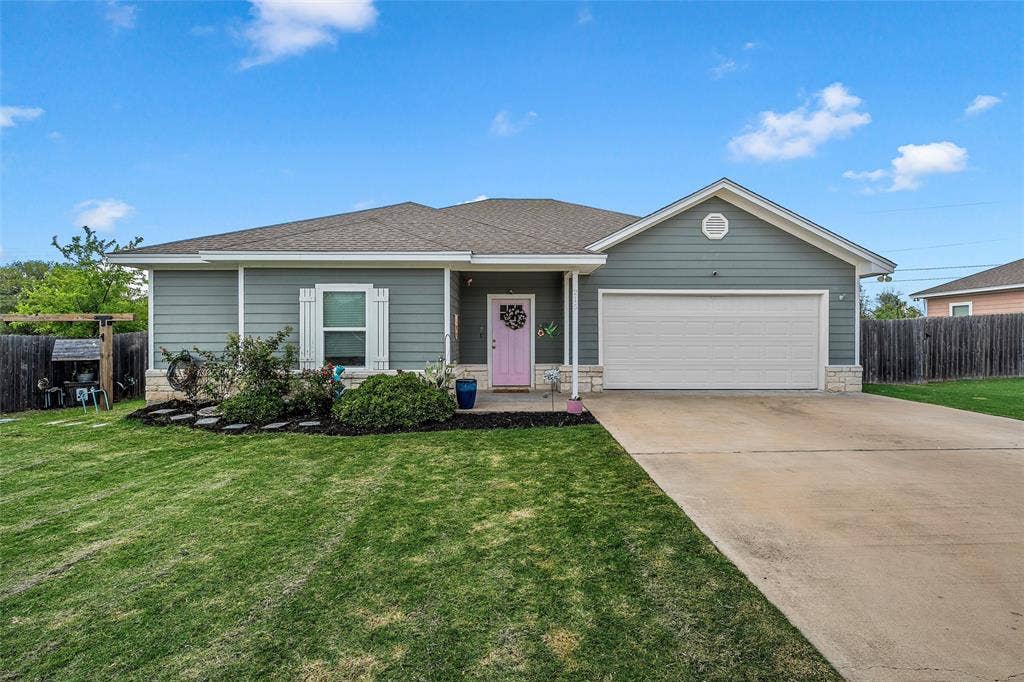 215 Greenbriar Street, Robinson, TX 76706 Single-story residence featuring horizontal siding and stone accents