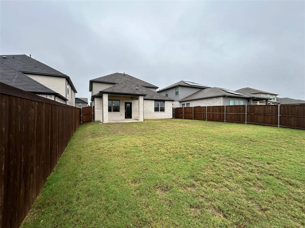 1323 Great Sand Dune Street, Royse City, TX 75189 Expansive grassy backyard featuring a full perimeter privacy fence