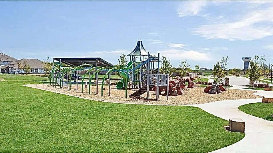 7212 Gray Wolf Lane, McKinney, TX 75071 Communal playground featuring a lawn