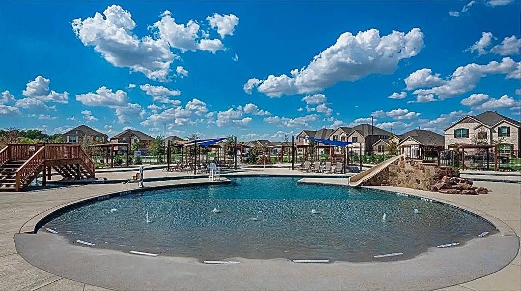 7212 Gray Wolf Lane, McKinney, TX 75071 Community pool with a residential view, stairs, and a patio