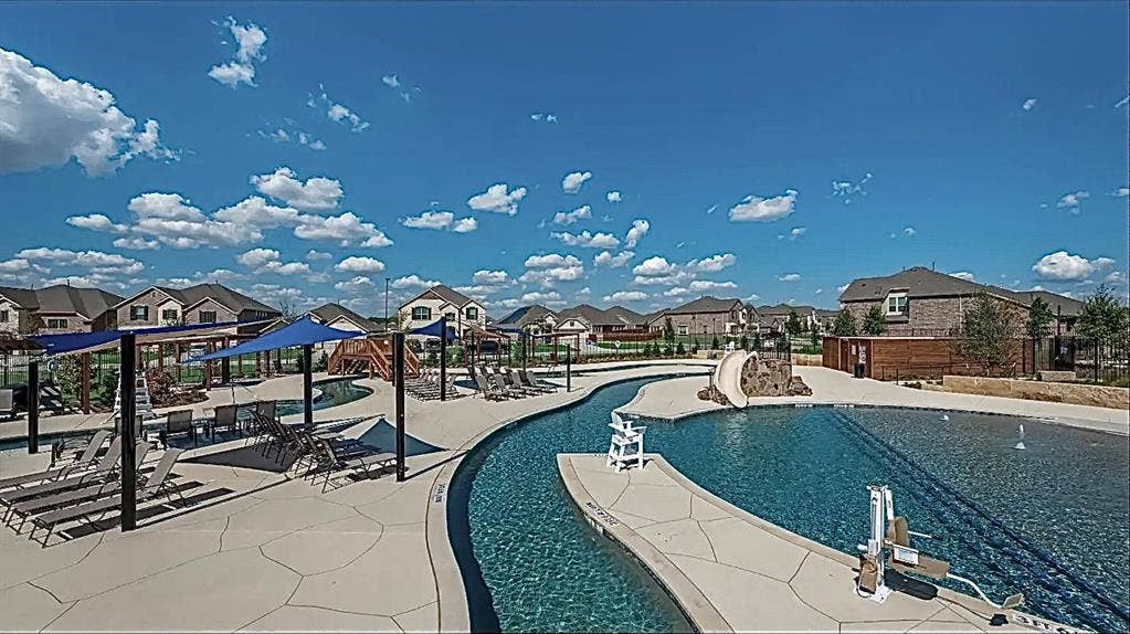 7212 Gray Wolf Lane, McKinney, TX 75071 Community pool featuring a residential view and a patio