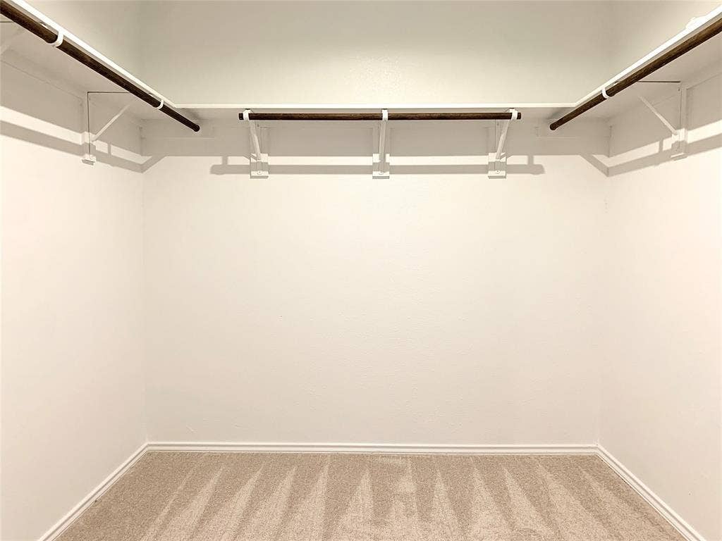 7212 Gray Wolf Lane, McKinney, TX 75071 Spacious closet featuring carpet flooring