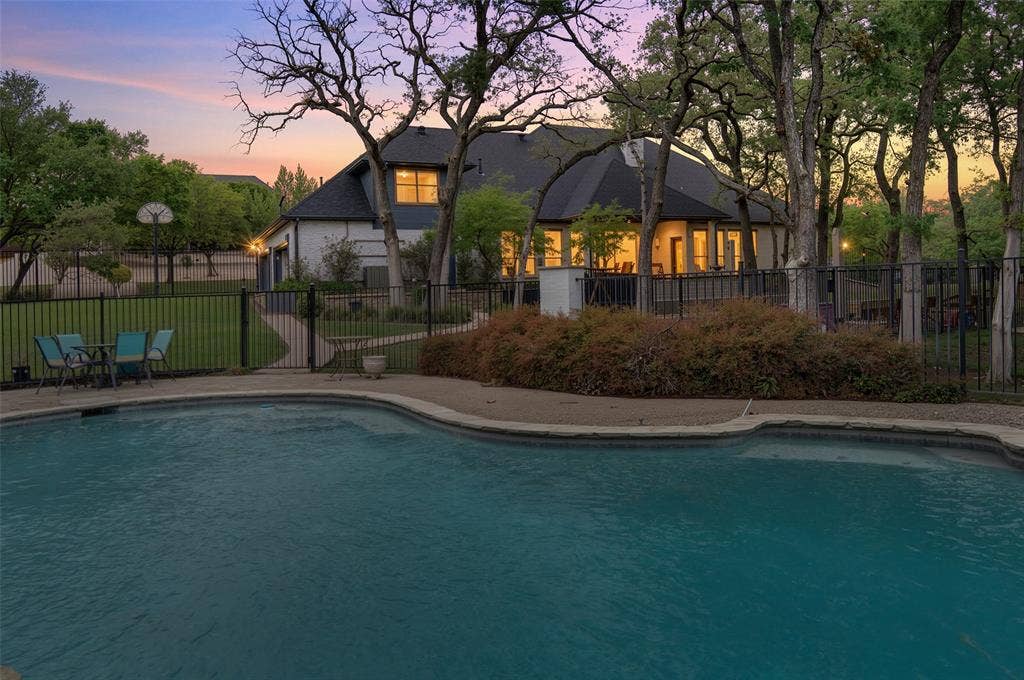 1202 Forest Park Drive, Weatherford, TX 76087 After a day of swimming and sunning in the pool, enjoy the beauty and serenity.
