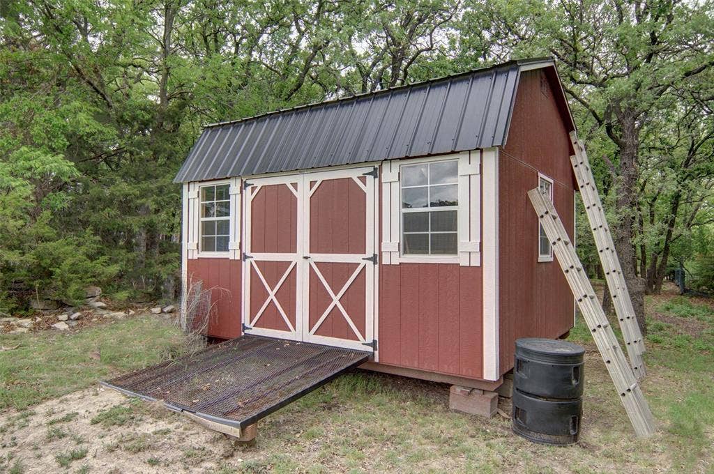 1202 Forest Park Drive, Weatherford, TX 76087 Great storage for yard tools and gardening supplies.
