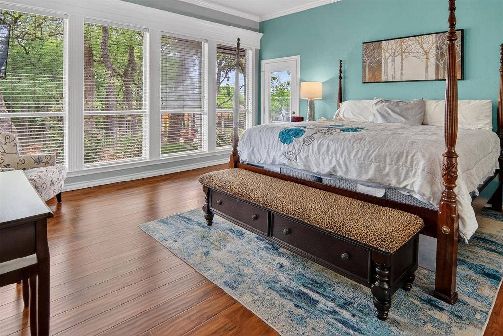 1202 Forest Park Drive, Weatherford, TX 76087 Wake up to a view of the lovely backyard through the wall of beautifully framed windows.