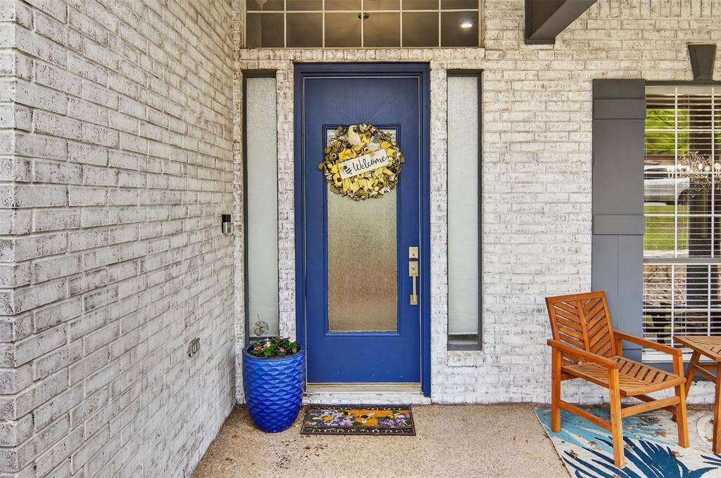 1202 Forest Park Drive, Weatherford, TX 76087 The covered front porch is just the beginning.
