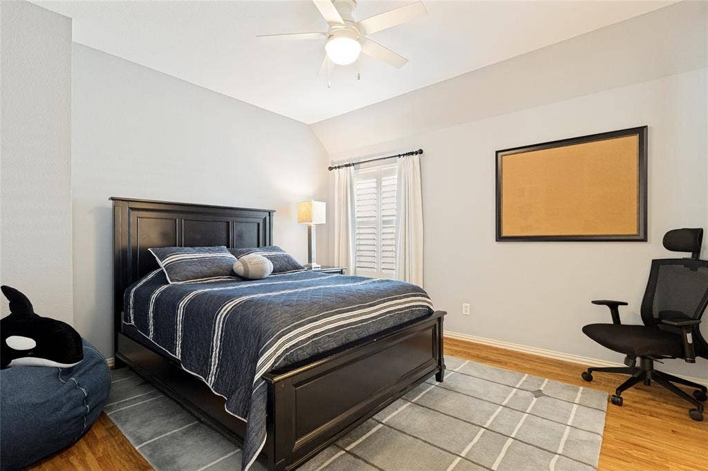 1021 Bandelier Drive, Allen, TX 75013 Bedroom #5 located on second level -Plantation Shutters, Hardwood floors, Ceiling Fan, WIC