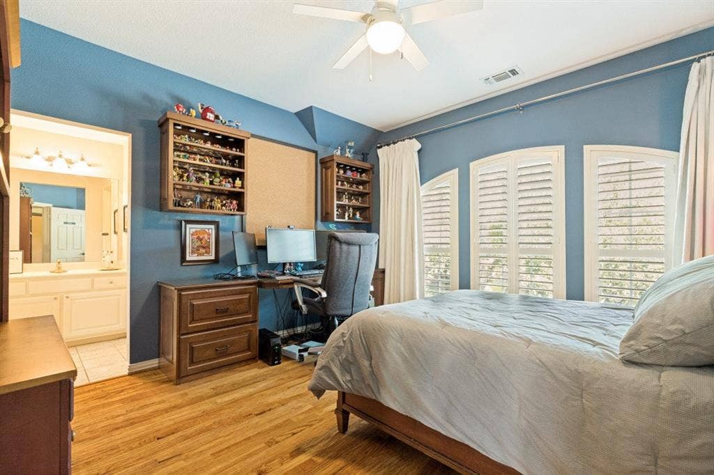 1021 Bandelier Drive, Allen, TX 75013 Bedroom #4 located on second level -Hardwood floors, Plantation Shutters, WIC, Ceiling Fan