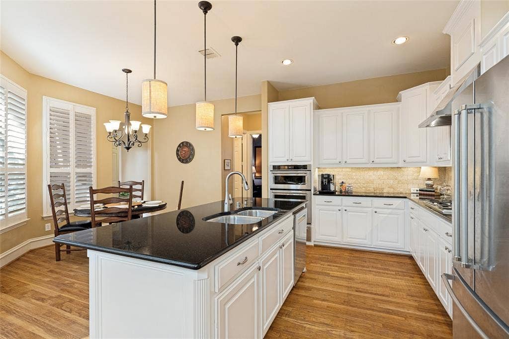 1021 Bandelier Drive, Allen, TX 75013 Island with view of breakfast room - Loads of Cabinets, SS Appliances, Gas Cooktop!