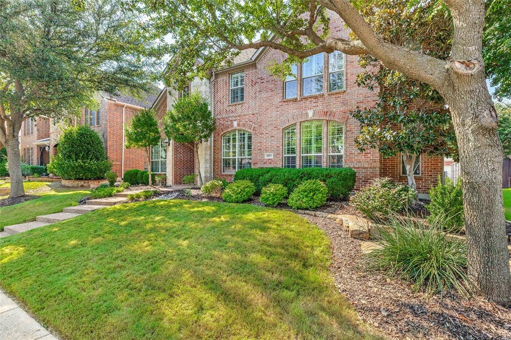 1021 Bandelier Drive, Allen, TX 75013 Mature trees and lovely landscaping and stone-lined flower beds