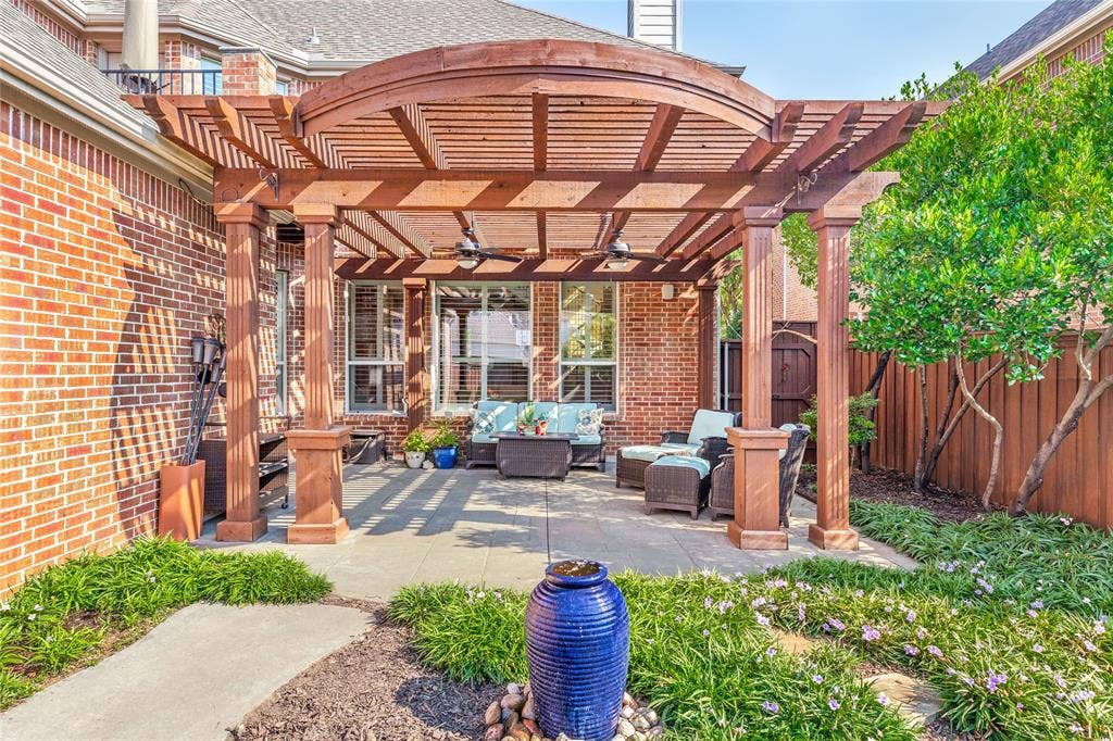 1021 Bandelier Drive, Allen, TX 75013 View of back patio with fountain and stepping stones to gate