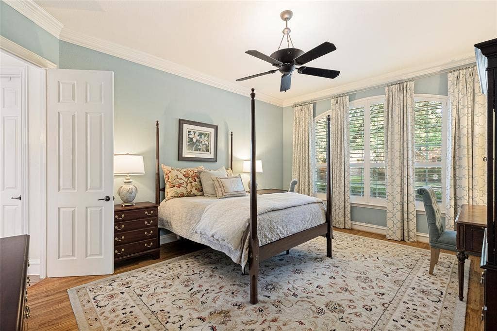 1021 Bandelier Drive, Allen, TX 75013 Primary Bedroom complete with Plantation Shutters, Ceiling Fan and Ensuite Bath