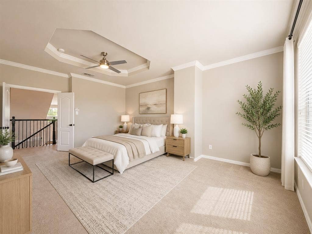 1709 Belton Drive, Prosper, TX 75078 Spacious bedroom featuring neutral carpeting, tray ceiling with fan, crown molding, and large windows with blinds