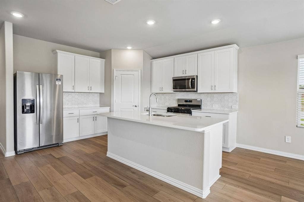 6110 Chickney Drive, Princeton, TX 75071 Photo is not of the actual home, but is an inspirational photo of builder’s model home and may depict options, furnishings, and/or decorator features that are not included.