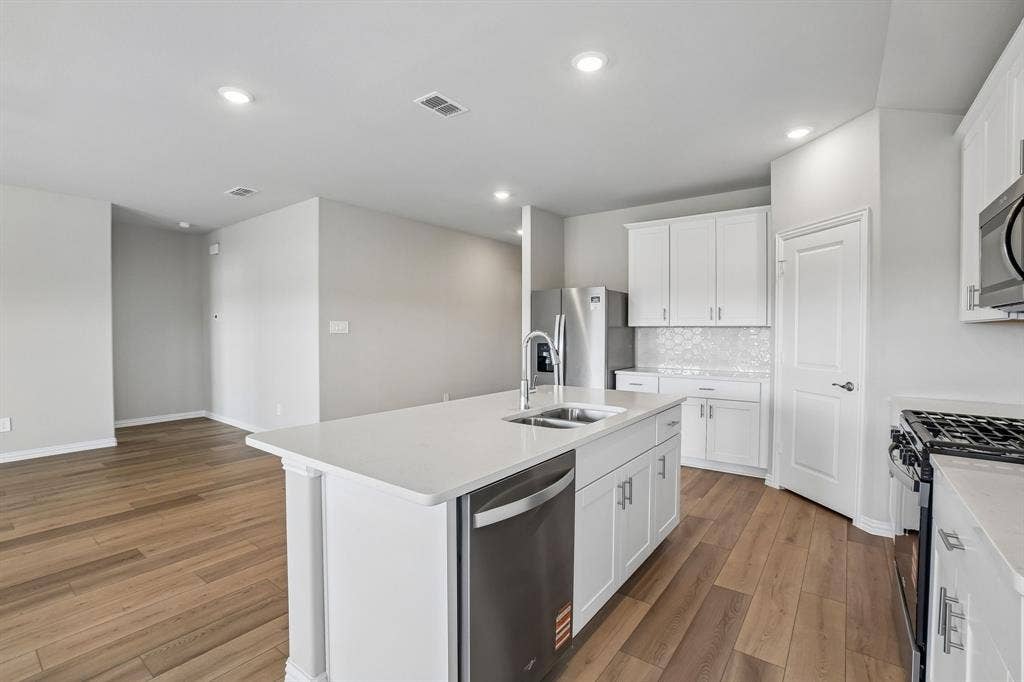 6110 Chickney Drive, Princeton, TX 75071 Photo is not of the actual home, but is an inspirational photo of builder’s model home and may depict options, furnishings, and/or decorator features that are not included.
